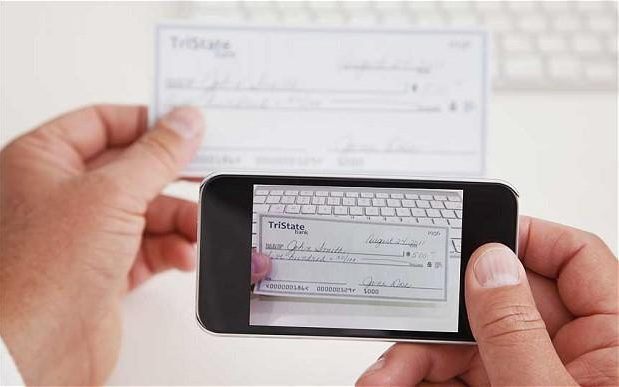 Mobile cheque payments to be delayed by another year